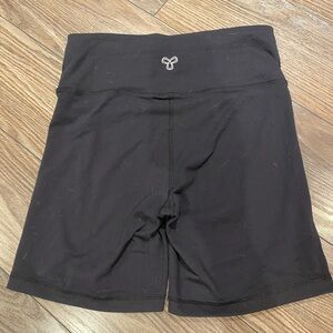 Aritzia Black Bike Shorts with Wide Waistband and Moisture-Wicking Fabric